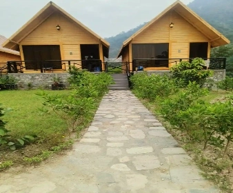 Deluxe Room Interior at Corbett Lads Resort Ramnagar with modern amenities